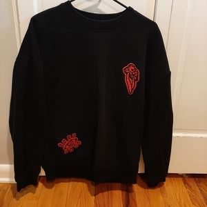 red and black sweater